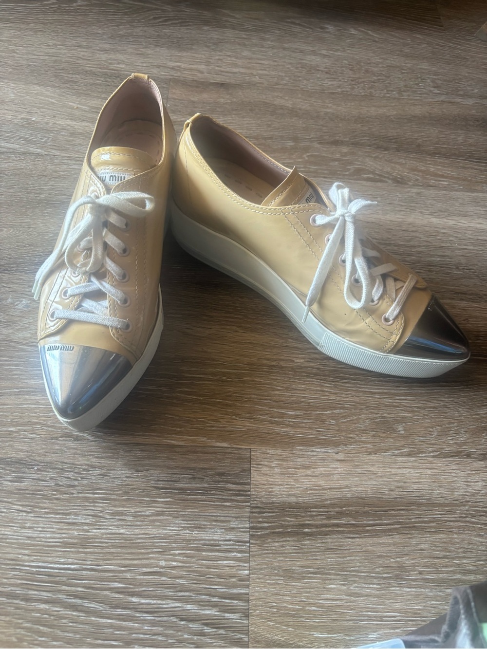 Miu Miu Pale Yellow Leather Sneakers with Silver Cap Toe and White Laces